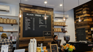 Black Press Coffee inside