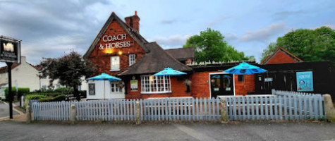 Coach Horses outside