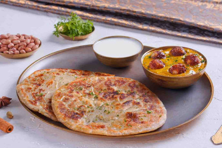 Singhada Aloo Paratha (2 Buc) Cu Malai Kofta Curry Mini Thali