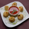 Spicy Veggie Fried Momos (8 Pcs)