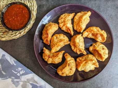 Veg Extreme Momos (6 Pcs) With Gravy