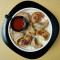 Schezwan Mushroom Butter Pan Fried Dimsums (8 Pcs)