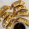 A12. Pork Dumplings (8)