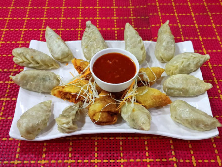 Steam Chicken Momos 12 Pcs, Chicken Spring Roll 6 Pcs, Served With Spicy Red Sauce Green Chutney