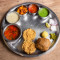 Dal Bafla Thali (Dal Kadhi Bafla (2) Aloo Ki Sabji Laddu (1 Pc) Green Chutney Garlic Chutney Onion) (Serves 1)