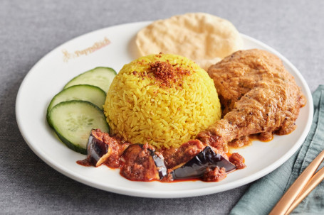 Nasi Kunyit With Masala Fried Chicken And Sambal Eggplants