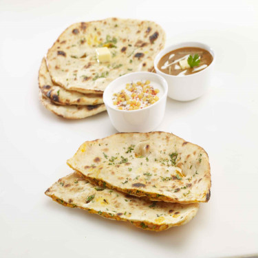 Choice Of Kulcha With Dal Raita (Served With Tandoori Kulcha Dal Makhani Boondi Raita)