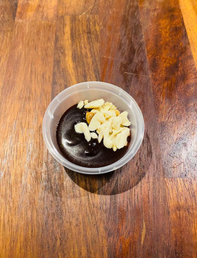 Tub Of Hoisin Sauce And Peanuts