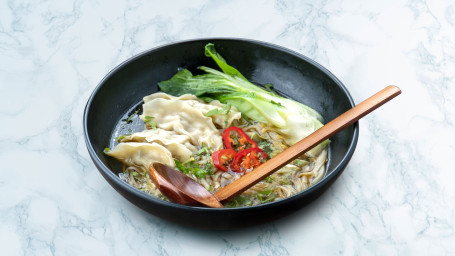 Ramen With Chicken Gyoza And Pak Choi In Aromatic Soy Broth