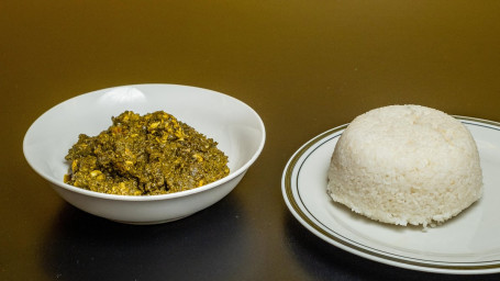 Cassava Leaves Served With White Rice, Jollof Or Fufu