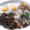 Chilaquiles Con Fajitas De Carne Y 2 Huevos (Nuestra Especialidad)