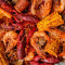 Ms. Piggy's Combo: 1 Lb Crawfish, 1 Lb Shrimp, 1Lb Clams, 4 Corn 4 Sausages