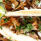 16. Two Carnitas Soft Tacos